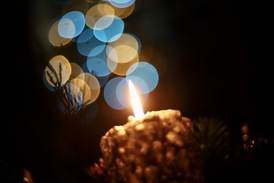 Close-up of illuminated light candles