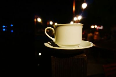 Close-up of coffee cup on table