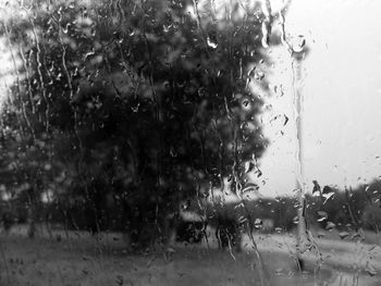 Close-up of wet window in rainy season