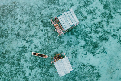 High angle view of abandoned swimming pool against sea