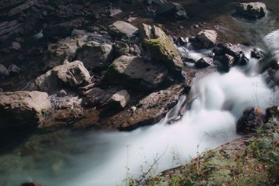 Stream flowing through rocks