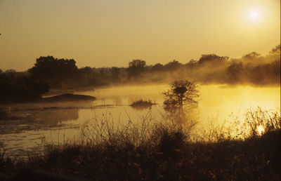 Scenic view of landscape at sunset