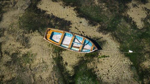 High angle view of text on beach