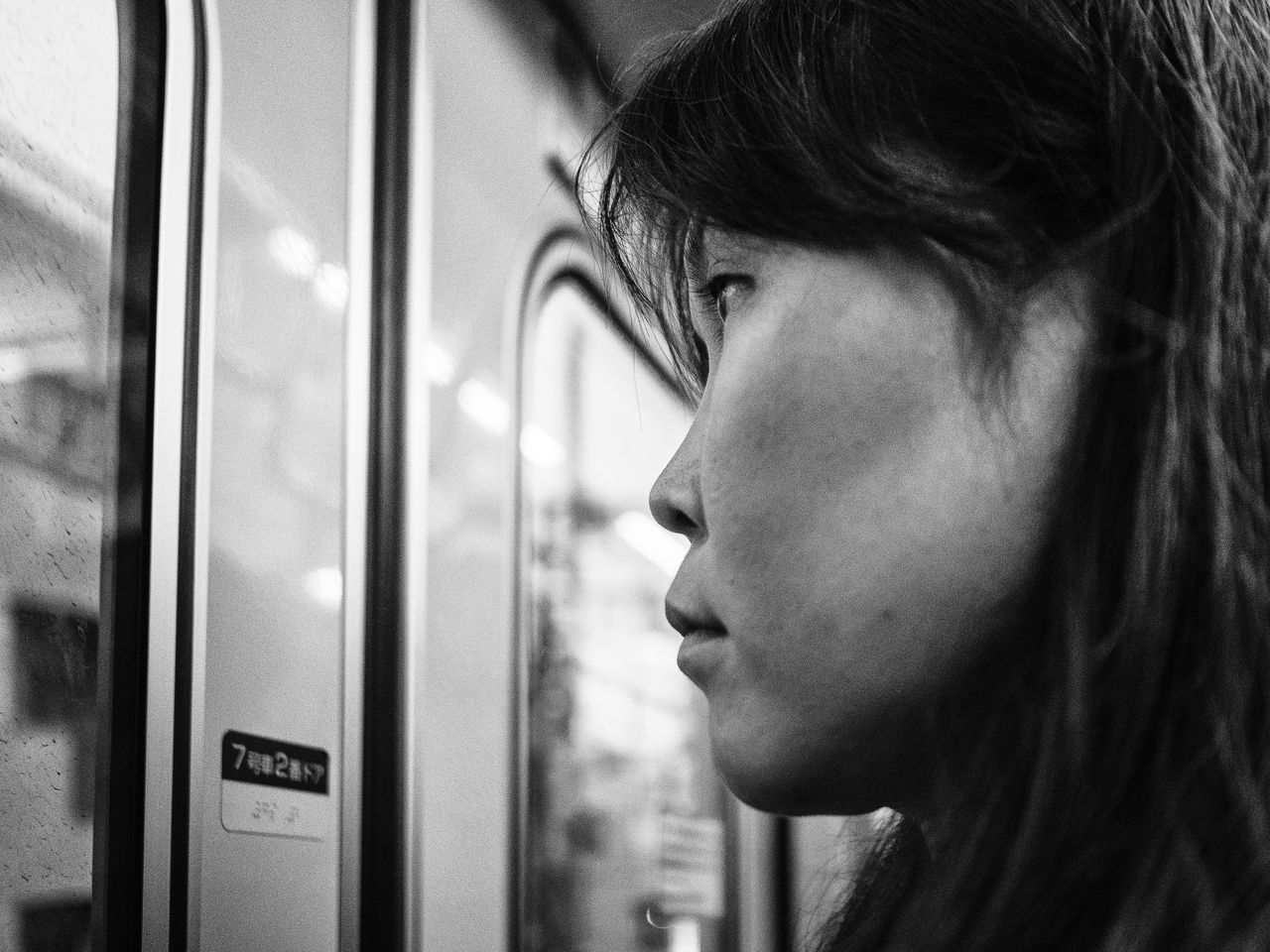 indoors, lifestyles, headshot, close-up, young adult, leisure activity, human face, person, contemplation, young women, wall - building feature, side view, auto post production filter, front view, part of, day, focus on foreground