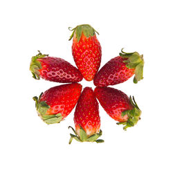 Close-up of strawberry over white background