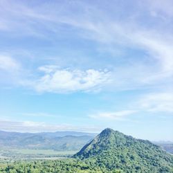 Scenic view of landscape against blue sky