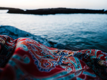 Colorful cloth at the sea