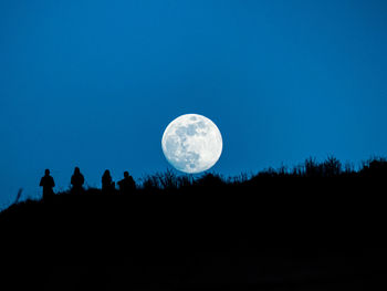 Scenic view of moon against sky at night