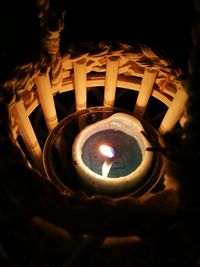 Low angle view of illuminated lights at night