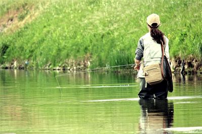 Woman standing in lake