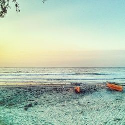 Scenic view of sea at sunset