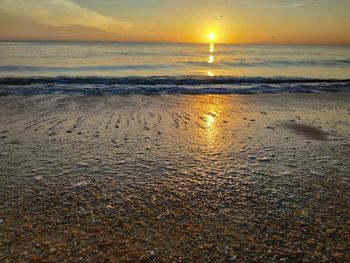 Scenic view of sea during sunset
