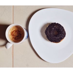 Directly above shot of coffee served on table