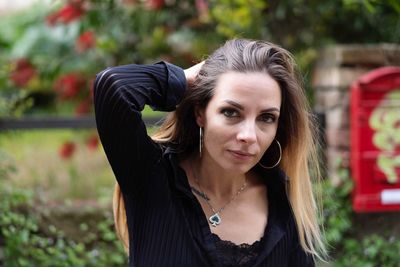 Portrait of beautiful woman in park