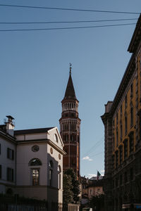 Low angle view of buildings against sky in city