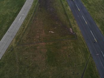 High angle view of road amidst field