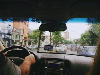 Cropped image of car on road