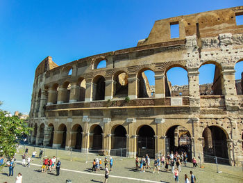 Group of people in front of historical building