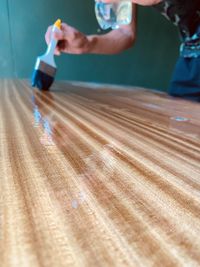 Midsection of person working on table