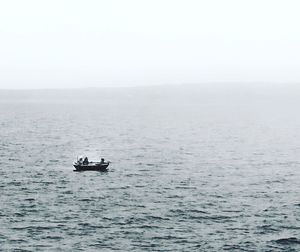 Boat sailing in sea