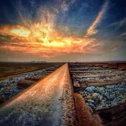 Scenic view of landscape against cloudy sky