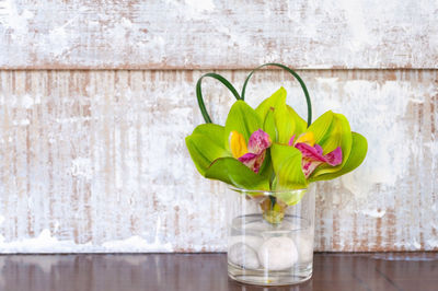 Close-up of flower vase on table