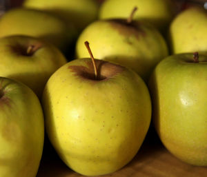 Close-up of granny smith apples for sale at market