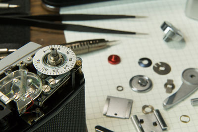 Close-up of camera and various tools