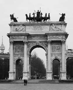 Porta sempione against sky in city