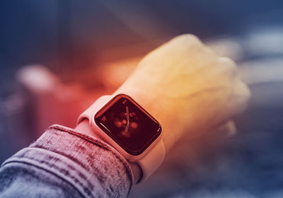 Close-up of human hand against blurred background