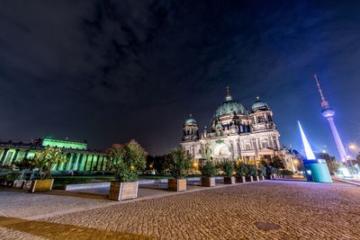 Berlin cathedral against sky in city at night