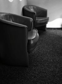 Close-up of sofa on table at home