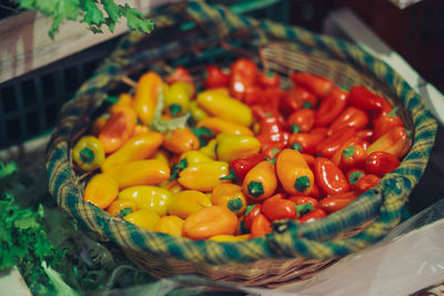 Close-up of tomatoes in basket for sale