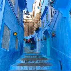 Narrow alley amidst buildings in city