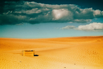 Scenic view of desert against sky