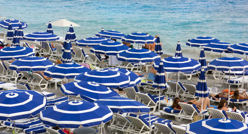 High angle view of chairs on beach