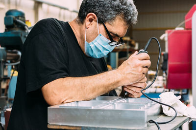 Side view of man working