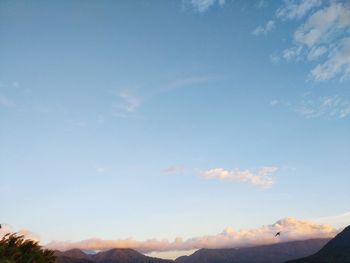 Low angle view of silhouette mountain against sky