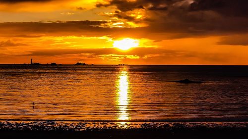 View of calm sea at sunset