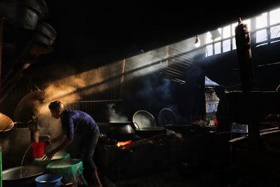 Man working at dusk