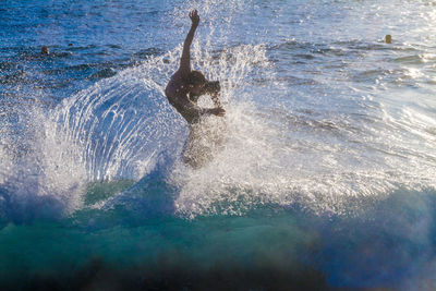 Waves splashing in water