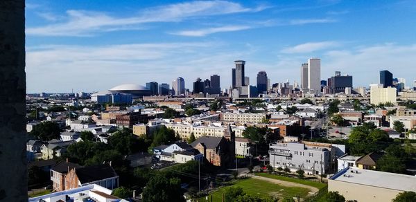 High angle view of buildings in city against sky