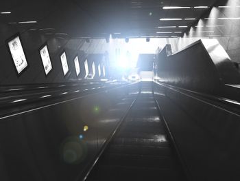 Low angle view of illuminated subway station