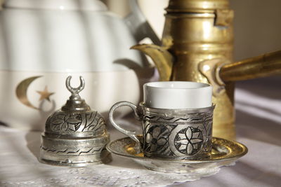 Close-up of tea cup on table