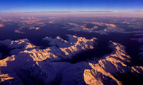 Aerial view of snow covered landscape