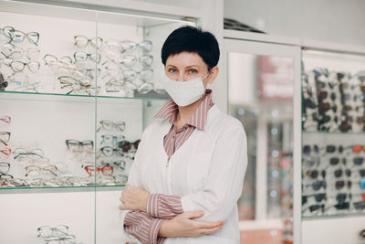 Portrait of mid adult man standing in store