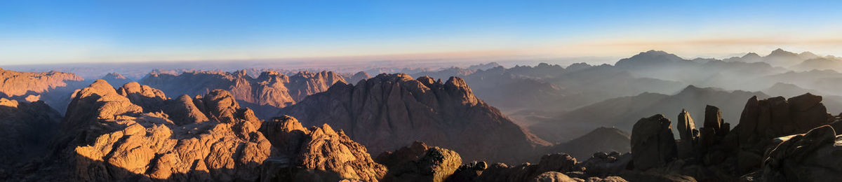 Panoramic view of mountains against sky during sunset