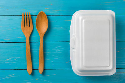 High angle view of lunch box on wooden table