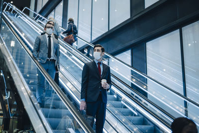 People on escalator