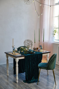 The luxury served table indoors in green colors